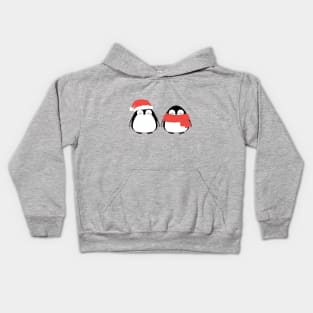 Couple of cute penguins, friends in winter Christmas red hat and scarf. Kids Hoodie